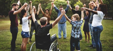 Group Of People Holding Hand Together In The Park
