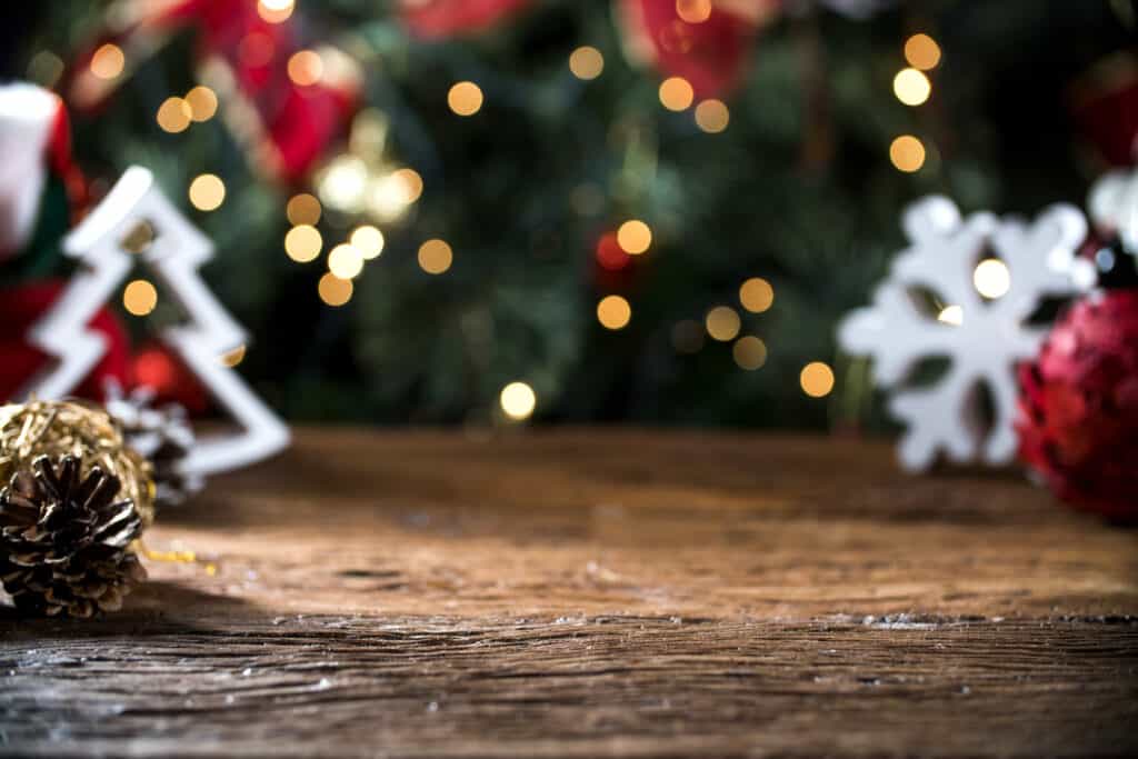 Christmas Table Blurred Lights Background, Wood Desk In Focus, X