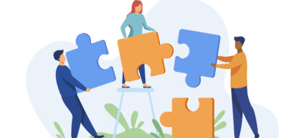Partners Holding Big Jigsaw Puzzle Pieces