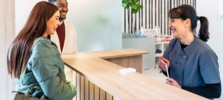 Couple Smiling At Receptionist In Dental Clinic 2025 05 07 18 52 46 Utc (1)